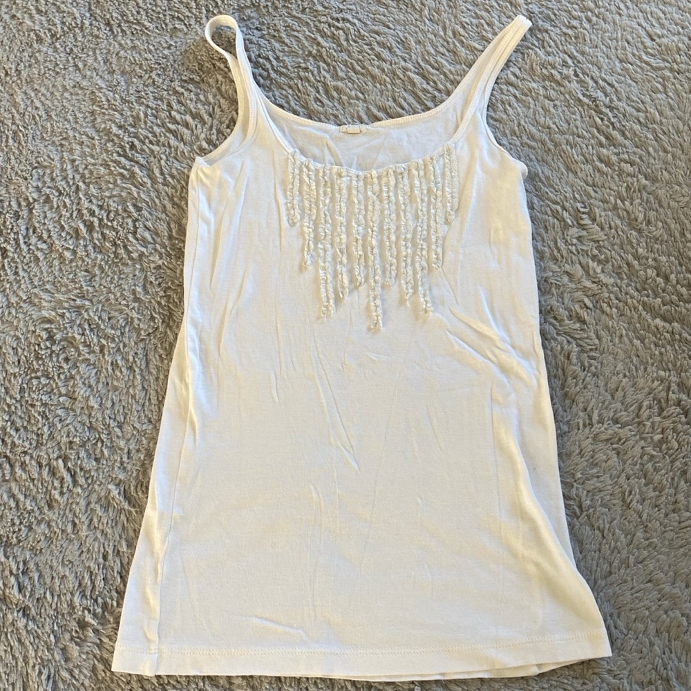 White j. crew tank top with a ruffle embellishment.